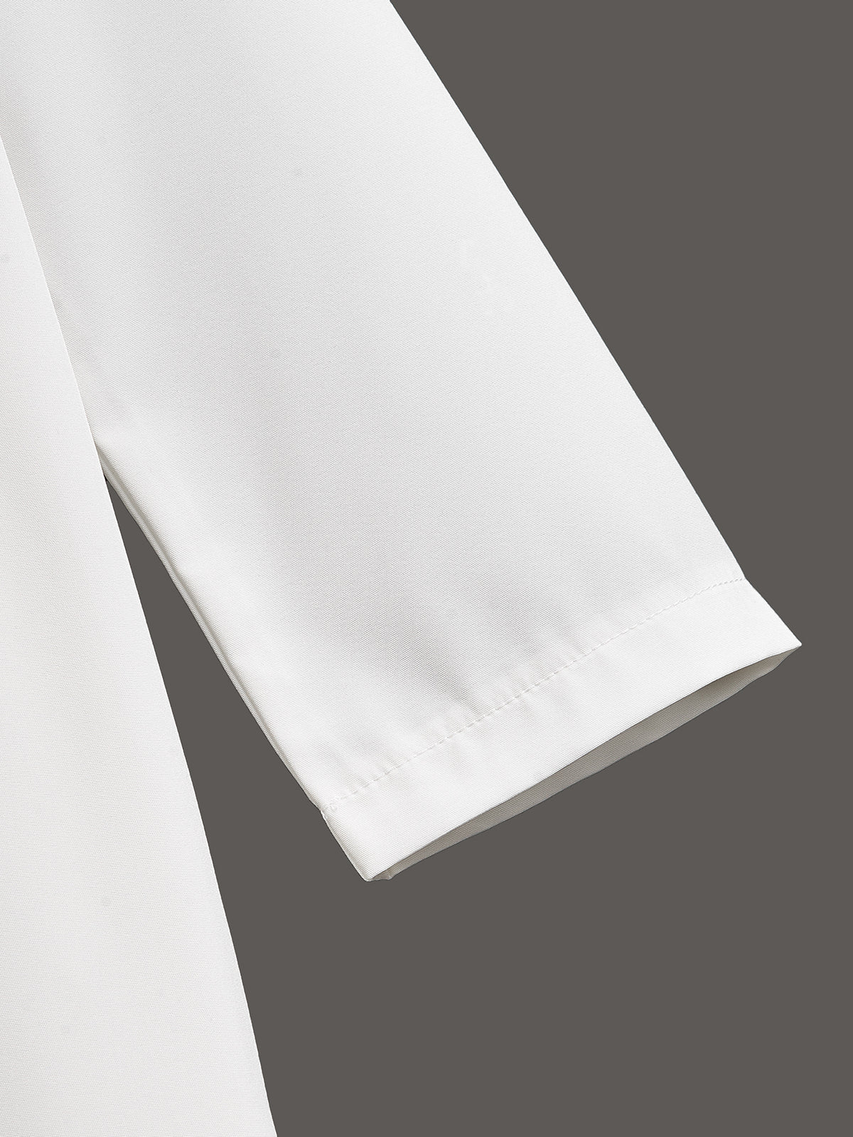 Boys' White Thobe with Black Ornamental Embroidery