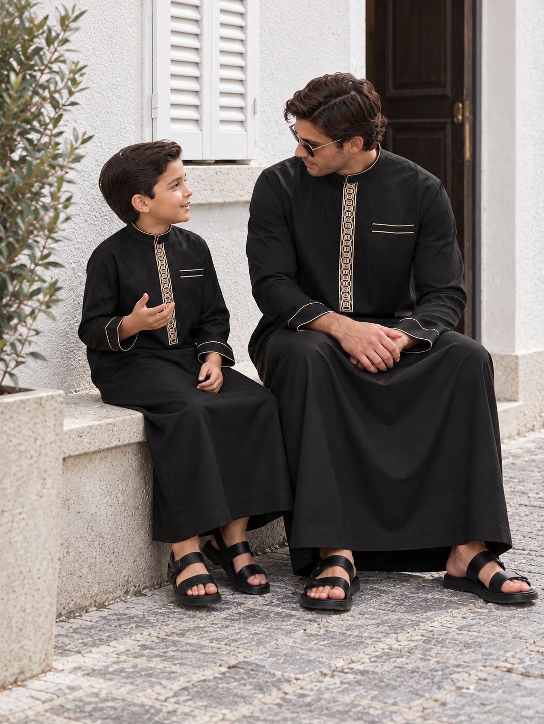 Matching Father & Son Black Thobes with Gold Geometric Embroidery – Long Sleeve Islamic Robes for Eid & Family Occasions